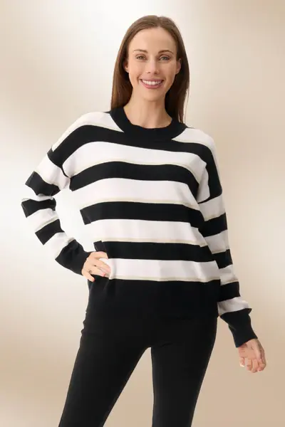 Woman in Givoni striped jumper.